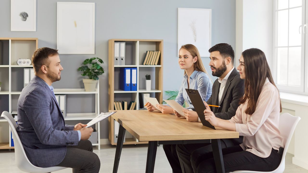 interview board member asks the candidate some questions